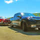 An American-Designed, American-Built Truck from a Japanese company towing one of the most American cars of all.